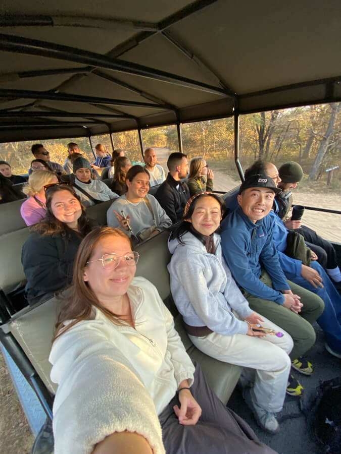 G Adventures group on a game drive in Khama Rhino Sanctuary, Botswana